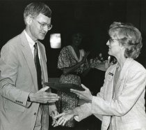 David P. Lewis with plaque